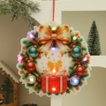 Gros plan d'une décoration de Noël en PVC éclairée avec boîte cadeau et ruban festif - Style Couronne de Noël