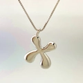 Silver puffed cross pendant necklace with polished finish on clean white background - Letter X / Silver