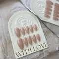 Glossy translucent nude pink almond press-on nails set on decorative rose display card - Elegant Nude Pink Style (532)