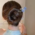 Silver hairpin with blue flowers and tassels shown on a traditional hairstyle - Gold Blue Auspicious Cloud Fan Tassel Style (138#)