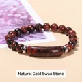 Natural Gold Swan stone beaded bracelet with reddish-brown minerals and silver metal spacers - Natural Gold Swan Stone