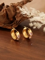 Detailed shot of gold hoop earrings with three pink round gemstones on dark wood - ZHE986 Style - Pink Rhinestone / 18K Gold