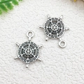Silver metal nautical helm charms with intricate patterns for DIY jewelry making - Round Ship Wheel (13.4x18.4mm)