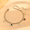 Detailed close-up of a silver Cuban link bracelet with black Roman numeral charms - Black Shell Round Steel Bracelet (T107)