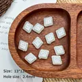 Detailed view of 13x12mm pearl white square flower beads with 2.4mm aperture for DIY crafts - Engraved Rhombus (13*12mm)