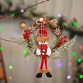 Detail of Christmas snowman wreath with red plaid fabric, berries and pine on vine base - Small Branch Snowman