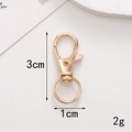 Detail of golden zinc alloy spring lobster clasp with dimensions 3cm height and 2g weight - Swivel Hook / 30MM / Gold