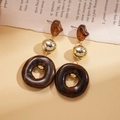 Detail of amber acrylic and gold metal beads on vintage style drop earrings - 925 Silver Pin Earrings / Dark Coffee