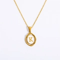 Gold oval pendant necklace featuring the letter K with a minimalist polished finish - Letter K - Gold