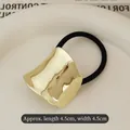Golden irregular hammered metal elastic hair tie accessory measuring 4.5cm - Arched Cloud Gold