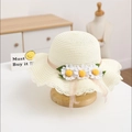 Detail of cream straw sun hat with white daisies and pink ribbon for children - Single Hat / Cream