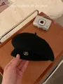Classic black wool beret for women featuring a gold JM metal plaque on a soft texture - Classic Black