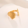 Detail of gold seashell and starfish design on minimalist stainless steel open ring - 18K Gold Shell Starfish