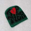 Detail of green Y2K knitted beanie featuring black Top Tier text and red broken heart - One Size / Dark Green