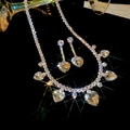 Sparkling silver zircon heart tassel necklace and earrings jewelry set on black background - White Set