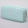 Trousse à maquillage en nylon vert clair avec fermeture dorée et texture tissée - Vert menthe