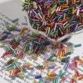 Colorful 2x7mm silver-lined bugle beads in mixed metallic hues for DIY jewelry - Diameter approx 2mm x Length approx 7mm 15g/Pack Approx 300 Pieces / Random Mixed Colors