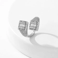 Macro detail of silver open ring featuring pave-set zircons and baguette cut stones - Style 6 / Silver