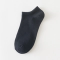 Single pair of solid black low-cut ankle socks with ribbed elastic cuffs in cotton blend - Black
