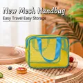 Yellow mesh beach bag with blue handles for kids' toys and effortless storage - Oversized Dopamine Toiletry Bag Yellow 26x21x10cm