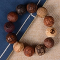 Multicolor carved rosewood beads bracelet with traditional Yin Yang and lotus patterns - Multicolor (20mm*12 Beads Premium Ox Design)