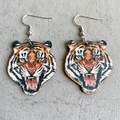 Detailed view of roar tiger head wooden drop earrings with silver metal hooks - Tiger