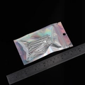 Laser holographic self-sealing bag with silver metal hooks on black background - Narrow Long
