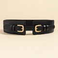 Close-up of elegant black wide corset belt with double gold buckles and elastic band - 19679 Black 65cm
