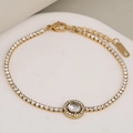 Luxury gold plated tennis bracelet with center round diamond and white cubic zirconia - Gold Round