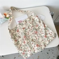 Close-up of beige corduroy tote bag featuring pink rose patterns and a fabric side label - 7 Beige Pink Line Flower