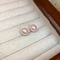 Close-up of elegant pink round pearl stud earrings with a glossy finish on jewelry tray - 20# Silver Earring Post - Pink Pearl - 9mm