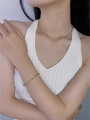 Bohemian gold titanium jewelry set with colorful enamel pendants on a female model - Multicolor Bracelet