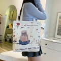 White canvas tote bag featuring cute cartoon girl and cat illustrations with text - Princess and Cat