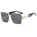 Lunettes de soleil carrées sans monture avec verres gris et branches chaîne dorées - Monture Or Noir Gris