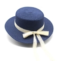 Detailed texture of navy woven straw hat with white lace ribbon and bow decoration - M (56-58cm) / Navy Blue