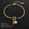 Elegant 14K gold plated stainless steel tennis bracelet with V letter and CZ pendant - Letter V
