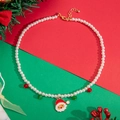 Christmas pearl necklace featuring a Santa Claus pendant with festive red and green beads - Single Santa Claus Pendant Style / White