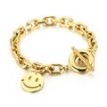 Bracciale dorato con chiusura OT e ciondolo a faccina sorridente con finitura lucida - Bracciale Oro