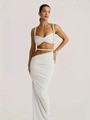 Detailed view of white two-piece resort set with halter tube top and side slit maxi skirt - White