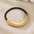 Detailed close-up of a high-elastic hair tie with a polished gold metallic crescent accent - Gold Single Layer Smooth