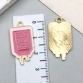 Pink blood bag and golden eagle square pendants for DIY jewelry making - Pink Infusion Bag