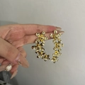 Elegant gold flower earrings in vintage style with polished multi-petal floral design - Polished Layered Flower