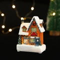 Close-up of a glowing resin Christmas candy shop miniature with snow details and LED light - Candy Shop (Style 23-A)