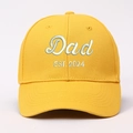 Close-up of yellow cotton baseball cap with white 3D Dad EST. 2024 embroidery details - Adjustable / Ginger Yellow