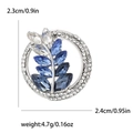 Vintage-Brosche in Blattform mit blauen Kristallen und weißen Strasssteinen in Silber - Blau