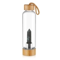 Bamboo glass water bottle with a natural dark hexagonal crystal pillar inside - Fireworks Stone Cup