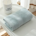 Thick light blue long-staple cotton towel with textured loops on a white tray - 33*73CM / Light Blue