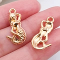 Gold mermaid charms showing intricate scale texture and hollow back design for DIY jewelry - Mermaid Pendant 22x11mm