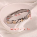 Stretch stainless steel clover bracelet with 60mm diameter and 9.3mm width details - J007-2 Silver Gold Clover