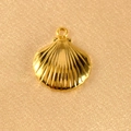 Macro detail of golden seashell charm pendant on textured fabric for jewelry DIY - Solid Shell (16.5mm)